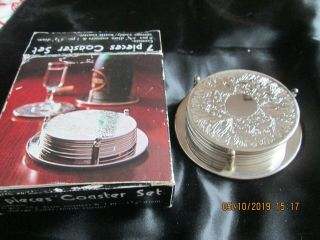 Set Of 6 Silver Plated Coasters In Holder.  Boxed.