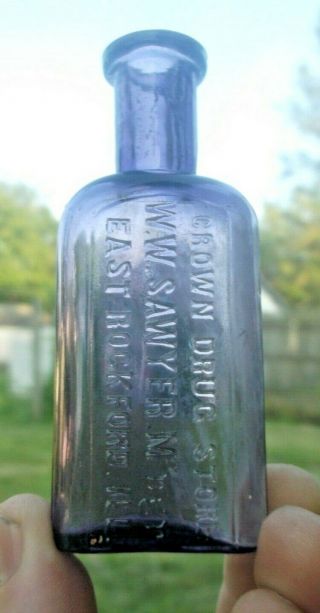 Purple Druggist Bottle W.  W.  Sawyer East Rockford,  Il 1890 