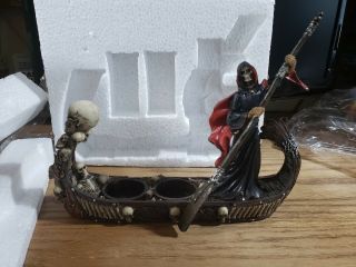 Grim Reaper On Skull Boat Salt And Pepper Shaker Holder