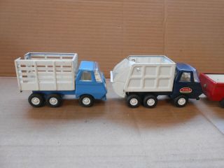 4 vintage metal tonka toy trucks and catipillar 2