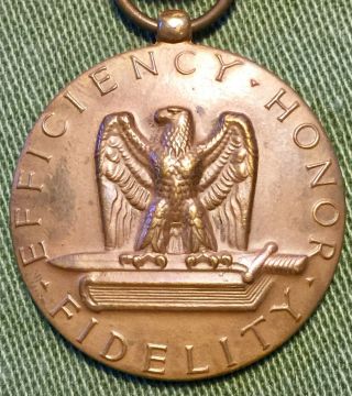 Engraved WWII U.  S.  Army Good Conduct Medal named to Eugene C Archibald 2