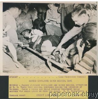 1945 World War Ii Press Photo Of Burned Okinawa Civilians Given Medical Care