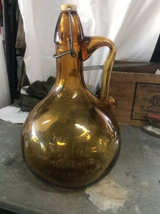 Vintage 1969 Old Time Mountain Moonshine Distilled 1904 Amber Jug Bottle Glass