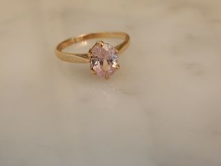 A 9 Ct Gold Pink Stone Set Broad Ring