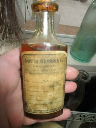 Antique Medicine Bottle Iron Mountain Michigan Louis Stoekly 225 Stephenson Ave