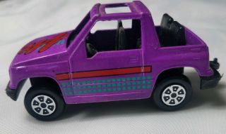 Tootsietoy Purple Graphic Chevrolet Geo Tracker Sport Utility Diecast Toy Suv