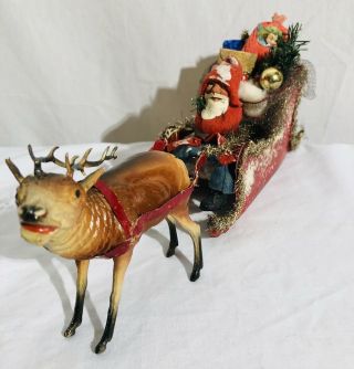 Antique German Santa Seated in Tin Sleigh of Toys Pulled by Composition Reindeer 3