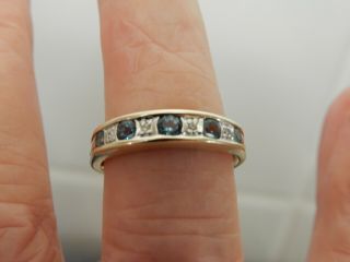 A Stunning 9 Ct Gold Blue Zircon And Diamond Cluster Ring