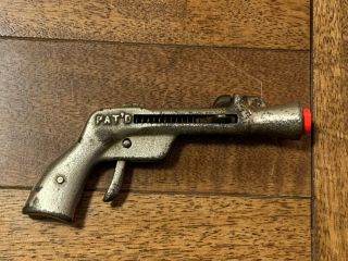 Grey Iron Bulls Eye Safety Cast Iron Cap Shooter - 1904 - Rarity