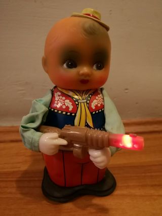 Red China Vintage Tin Wind Up Battery Toy.  Shooting Boy.  Ms 576.