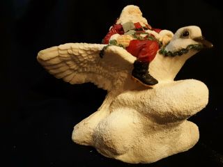 The Legend Of Santa Claus By United Design Santa Riding Dove By Larry Miller
