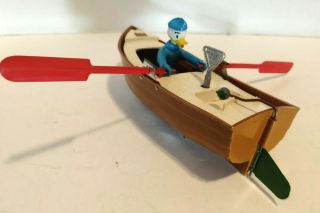 Tri - Ang Minic Wind Up Donald Duck In A Row Boat