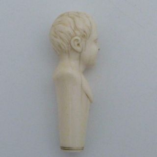 GEORGIAN UMBRELLA HANDLE CARVED IN THE IMAGE OF THE BUST OF A YOUNG BOY 2