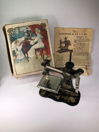 Antique German Toy Sewing Machine,  Box And Instructions