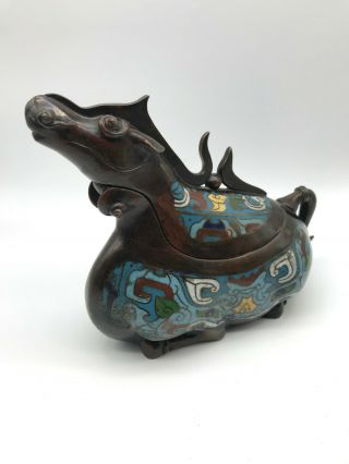A Chinese bronze and cloisonne enamel incense burner and cover.  item 3