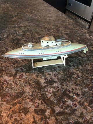 Toy German Wind Up Submarine With Stand.