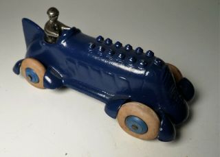 A.  C.  Williams Cast Iron Boat Tail Blue Racer W/ Driver Embossed Piston - Hubley