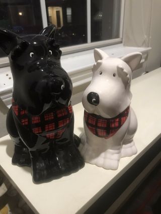 Two Scotty Cookie Jars.  One Black One White