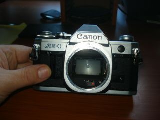 VINTAGE CANON AE - 1 35MM CAMERA WITH CANON FD S.  C.  1:1.  8 50MM LENS EX COND 2