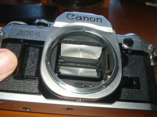 VINTAGE CANON AE - 1 35MM CAMERA WITH CANON FD S.  C.  1:1.  8 50MM LENS EX COND 3
