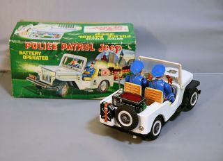 T.  N Nomura Tin police jeep battery operated 60s japan top (video) 3