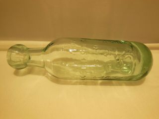 English Blob Top Aqua Torpedo Bottle E.  Lyon Eccleston Embossed Lion Trade Mark