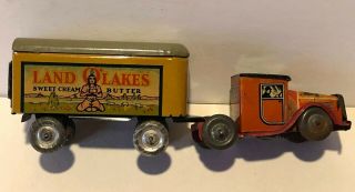 Vintage Lindstrom Land O Lakes Wind - Up Tin Litho Toy Truck And Trailer
