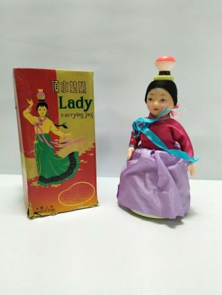 Red China Battery Operated Tin Toy - Lady Carrying Jug Me - 401 1970s