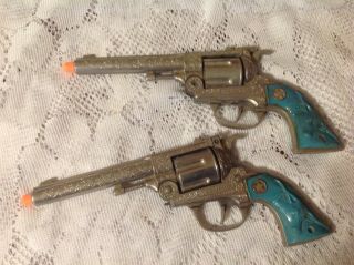 Pair Turquoise Vintage Toy Cap Gun Hubley Texan 38 Pistols