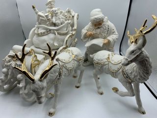 Grandeur Noel Porcelain Santa And Sleigh 4 Piece Set Reindeer
