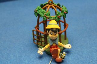 Enesco Disney Pinocchio Puppet Cage Jiminy Cricket Christmas Ornament Arms Move