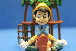 Enesco Disney Pinocchio Puppet Cage Jiminy Cricket Christmas ornament arms move 2