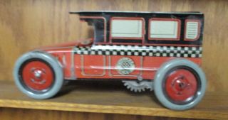 1920’s J.  Chein & Co.  Tin Litho Wind Up Checker Taxi Toy