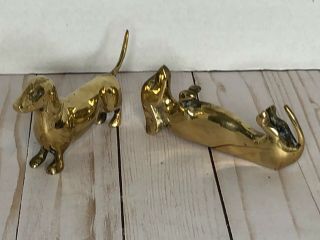 2 Vintage Solid Brass Dachshund Weiner Dog Figurines.  Each Approx.  5” Long Euc