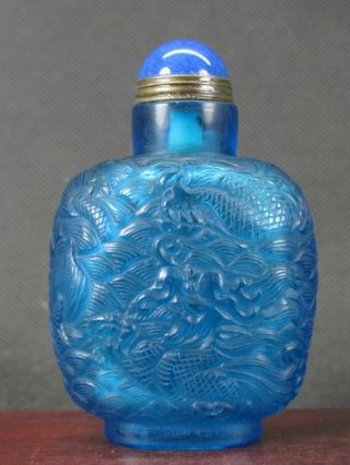 Chinese Two Dragon Carved Blue Peking Glass Snuff Bottle