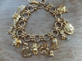Kirks Folly Gold Tone Cat Bracelet Hanging From Chain Bracelet