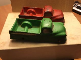 Two (2) Vintage Auburn Rubber 1950’s Pick - Up Trucks,  Green & Red