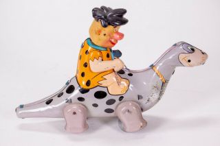 Vintage Marx Fred Flintstone Riding Dino Dinosaur Wind Up Litho Tin Toy