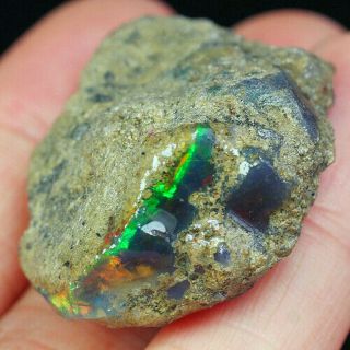73.  6ct Natural Ethiopian Crystal Black Opal Play Of Color Rough Specimen Ysj2678