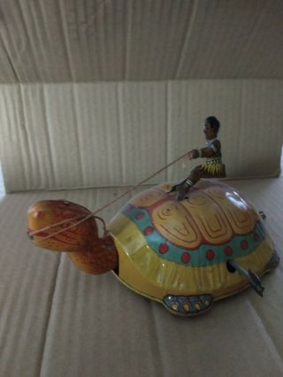 Tin Wind Up Turtle With Native On Its Back