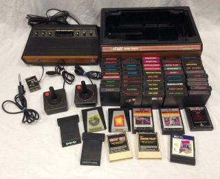 Vintage Atari 2600 Console System W/ 2 Controllers,  59 Games & Game Storage