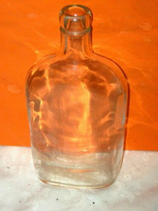 A Vintage Johnnie Walker Scotch Whisky Embossed Cork Seal Hip Flask Bottle