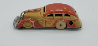 Marx Tricky Taxi Windup Tin Litho Toy W/ Busy Street Tin Litho Platform