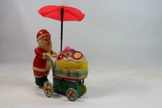 Japan Celluloid Tin Christmas Santa Claus Toy Carriage Umbrella 6 " Tall