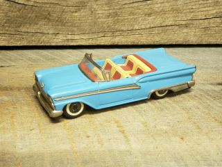 1959 Vintage Haji Blue Ford Fairlane Convertible Tin Friction Toy Car