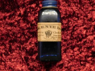 Vintage Colbalt Blue Clock Oil Bottle W.  F.  Nye Inc.  Bedford Mass.