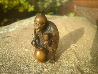Hand Carved Wood Netsuke Man Beer From Barrel Collectable Boxwood Figure