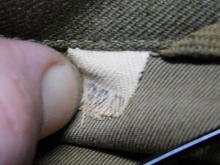 Orig WW2 wool jacket,  pants and garrison cap.  Distinguished unit badge. 3