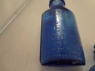 4 Embossed Cobalt Blue Phillips Milk of Magnesia Bottles 5 Inch 2