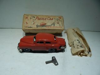 Occupied Japan Tin Toy Puzzle Car - By Kosege - 1940 